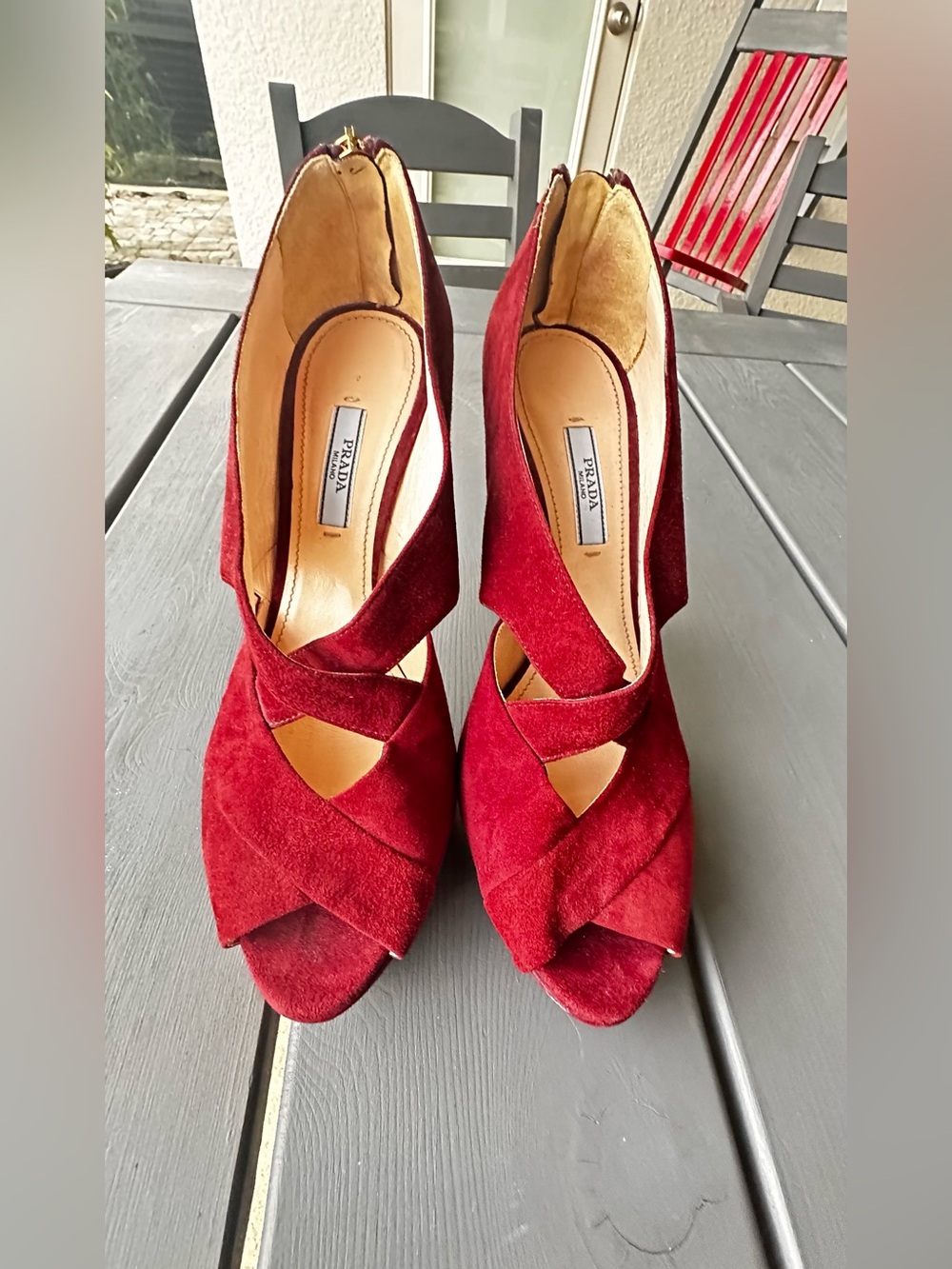 Prada peep-toe platform heels featuring elegant crisscross straps  size 9.5